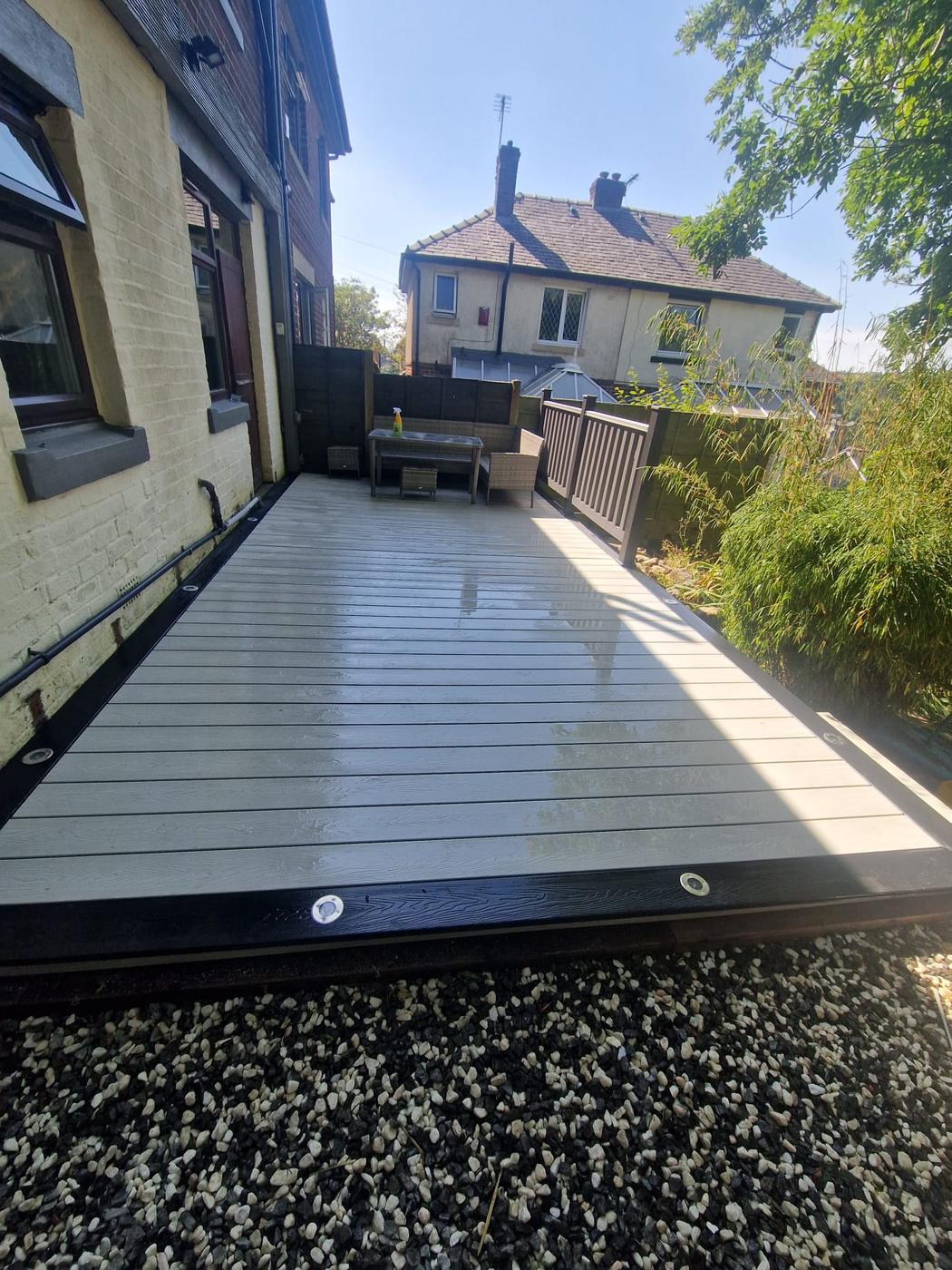 Composite decking and edge lighting replacing an old timber deck, Ashburys Property Renovations, Stockport
